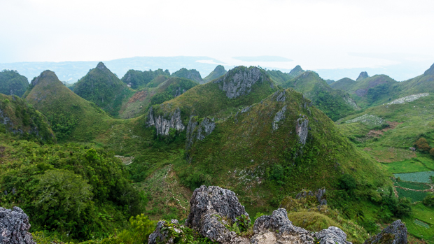 View at the Peak. (ISO 100 16mm f / 5.6 1/5sec) A distinctive feature in Mantolongon are these cone shaped mountains that dot the landscape all the way to the sea. I heard it referred to as Karst Topography, but I'm no geologist so I can't be sure.